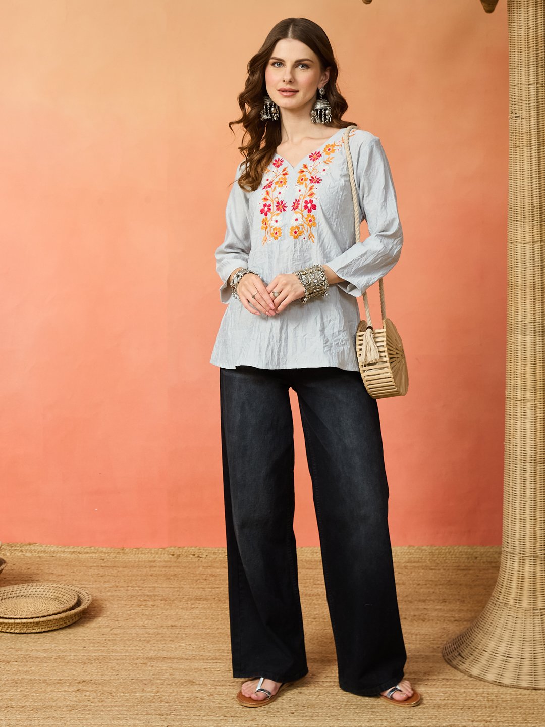 Women's Light Blue Embroidered Cotton-Style Kurti with Floral Front Design